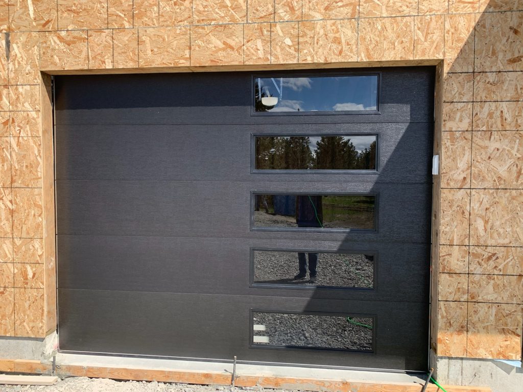 black garage door with windows